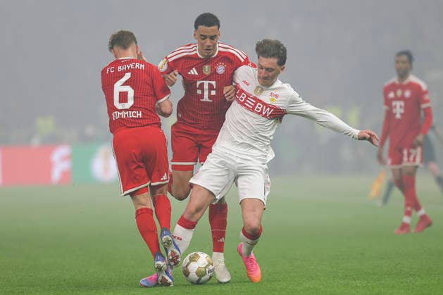 Joshua Kimmich FC Bayern München , Jamal Musiala FC Bayern München and Angelo Stiller VfB Stuttgart battle for the ball during the DFB Cup Final 2026 match between FC Bayern München and VfB Stuttgart at Olympiastadion on May 23, 2026 in Berlin, Germany Photo by Oliver Kaelke DeFodi Images