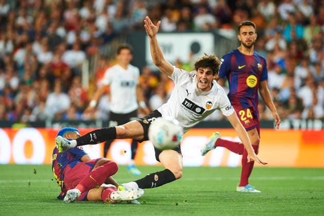 Ronald Araujo FC Barcelona and Javi Guerra Valencia CF during the LaLiga EA Sports match between Valencia CF and FC Barcelona at Estadio de Mestalla on May 23, 2026 in Valencia, Spain Photo by Maria Jose Segovia DeFodi Images