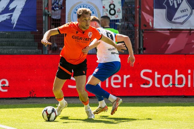 Cottbus, Germany 23 May 2026 Brandenburg State Cup 2025 2026 Final FC Energie Cottbus vs VfB Krieschow In the picture from left in duel Dennis Slamar Energie Cottbus and Leo Felgentraeger Felgentraeger VfB Krieschow DFB regulations prohibit any use of photographs as image sequences and or quasi video LEAG Energie Stadion Brandenburg Copyright: xFotostandx xWeilandx