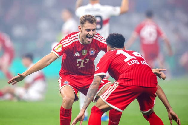 23 05 2026, Football, 83 DFB Pokal Final,, FC Bayern München VfB Stuttgart, Olympioastadion Berlin, Season 2025 2026 Goal celebration after the goal to 2 0 by scorer Harry Kane FC Bayern Muenchen 09 in picture Josip Stanisic FC Bayern Muenchen 44 with Luis Diaz FC Bayern Muenchen 14 DFB regulations prohibit any use of photographs as image sequences and or quasi video Berlin Germany