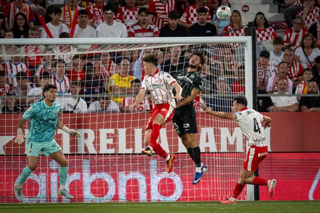 Viktor Tsygankov Girona FC and Victor Chust Elche CF battle for the ball during a La Liga EA Sports match between Girona FC and Elche CF at Estadi Municipal de Montilivi in Girona, , Spain, on May 23 2026 Photo by Felipe Mondino Copyright: x@FELIPExMONDINOx