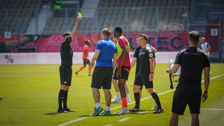 Soccer, Men, Season 2025 2026, Brandenburg State Cup, Final, Final day of the amateurs, FC Energie Cottbus vs VfB 1921 Krieschow, Saturday 23 05 2026, LEAG Energie Stadion Cottbus, In the picture Max Göldner l shows a yellow card against Energie Bank Brandenburg Germany