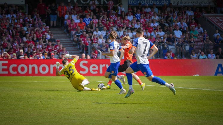Soccer, Men, Season 2025 2026, Brandenburg State Cup, Final, Final day of the amateurs, FC Energie Cottbus vs VfB 1921 Krieschow, Saturday 23 05 2026, LEAG Energie Stadion Cottbus, In the picture Sebastian Mellack yellow, Krieschow and Ted Tattermusch orange, Energie Brandenburg Germany