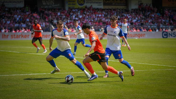 Soccer, Men, Season 2025 2026, Brandenburg State Cup, Final, Amateur final day, FC Energie Cottbus vs VfB 1921 Krieschow, Saturday 23 05 2026, LEAG Energie Stadion Cottbus, In the picture from l Tobias Gerstmann Krieschow , Can Moustfa Energie and Toby Michalski Krieschow Brandenburg Germany