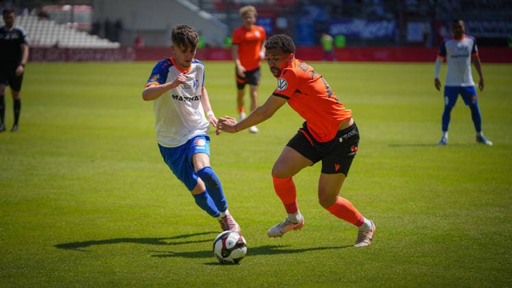Soccer, Men, Season 2025 2026, Brandenburg State Cup, Final, Final day of the amateurs, FC Energie Cottbus vs VfB 1921 Krieschow, Saturday 23 05 2026, LEAG Energie Stadion Cottbus, In the picture Toby Michalski l Krieschow and Merveille Biankadi r Energie Brandenburg Germany