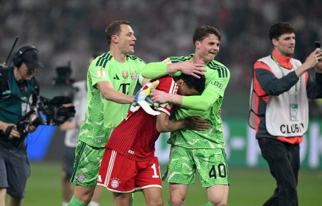 Soccer DFB Cup Final 2025 2026 in Berlin FC Bayern Muenchen VfB Stuttgart 23 05 2026 Winner FC Bayern Muenchen cheers after the victory with from left , goalkeeper Manuel Neuer, Jamal Musiala , goalkeeper Jonas Urbig