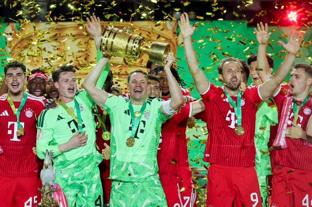Aleksandar Pavlovic FC Bayern Munich , Goalkeeper Jonas Urbig FC Bayern Munich , Goalkeeper Manuel Neuer FC Bayern Munich , Harry Kane FC Bayern Munich and Josip Stanisic FC Bayern Munich cheering with the DFB Cup, DFB Cup Final 2026, FC Bayern Munich v VfB Stuttgart, Olympiastadion on May 23, 2026 in Berlin, Germany Photo by Marco Steinbrenner DeFodi Images Aleksandar Pavlovic FC Bayern Munich , Goalkeeper Jonas Urbig FC Bayern Muenchen , Goalkeeper Manuel Neuer FC Bayern Muenchen , Harry Kane FC Bayern Muenchen and Josip Stanisic FC Bayern Muenchen cheering on the DFB Cup, DFB Cup Final 2026, FC Bayern München v VfB Stuttgart, Olympiastadion, May 23, 2026 in Berlin, Germany Photo by Marco Steinbrenner DeFodi Images