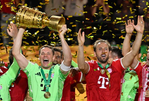 after the end of the match cup handover FC Bayern celebrate victory DFB Cup goalkeeper Manuel Neuer FC Bayern Muenchen FCB 01 Harry Kane FC Bayern Muenchen FCB 09 83 DFB Cup Final FC Bayern Muenchen FCB vs VFB Stuttgart Olympiastadion Berlin 23 05 2026 DFL REGULATIONS PROHIBIT ANY USE OF PHOTOGRAPHS AS IMAGE SEQUENCES AND OR QUASI VIDEO 83 DFB Cup Final FC Bayern Muenchen FCB vs VFB Stuttgart