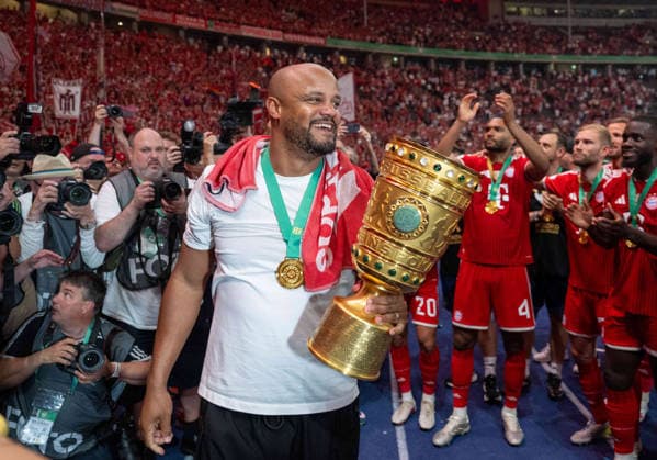 Soccer, Men, Season 2025 2026, 83 DFB Cup Final, FC Bayern Munich VfB Stuttgart, Award Ceremony Bayern, Coach Vincent Kompany Bayern Munich with trophy in the East Curve with the fans, 23 05 2026, Copyright: xMatthiasxKochx