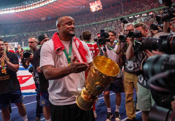 Soccer, Men, Season 2025 2026, 83 DFB Cup Final, FC Bayern Munich VfB Stuttgart, Award Ceremony Bayern, Coach Vincent Kompany Bayern Munich with trophy in the East Curve with the fans, 23 05 2026, Copyright: xMatthiasxKochx