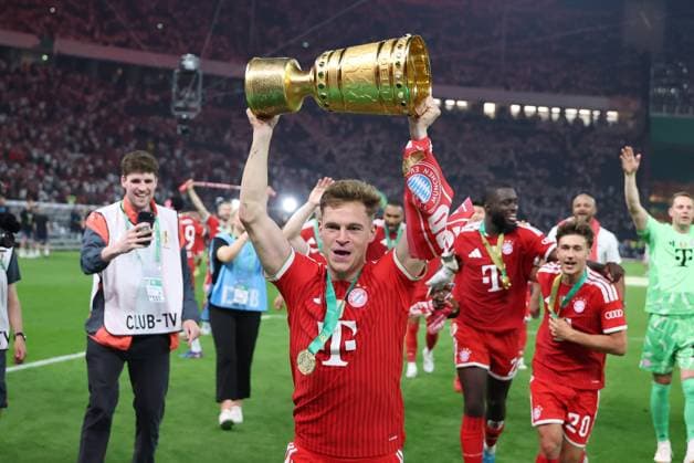 Joshua Kimmich 6 FC Bayern Muenchen holds the DFB Pokal in his hands, FC Bayern Muenchen vs VfB Stuttgart, Football, 83 DFB Pokalfinale, 23 05 2026 DFL DFB regulations prohibit any use of photographs as image sequences and or quasi video Berlin Berlin Germany Copyright: xkolbert-press ChristianxKolbertx