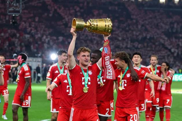 Joshua Kimmich 6 FC Bayern Muenchen holds the DFB Pokal in his hands, FC Bayern Muenchen vs VfB Stuttgart, Football, 83 DFB Pokalfinale, 23 05 2026 DFL DFB regulations prohibit any use of photographs as image sequences and or quasi video Berlin Berlin Germany Copyright: xkolbert-press ChristianxKolbertx
