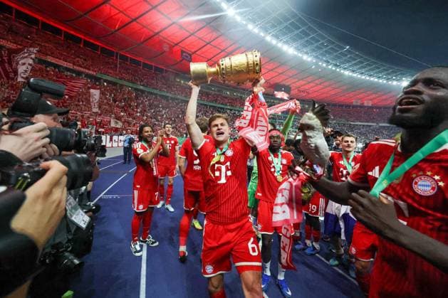 Joshua Kimmich 6 FC Bayern Muenchen holds the DFB Pokal in his hands, FC Bayern Muenchen vs VfB Stuttgart, Football, 83 DFB Pokalfinale, 23 05 2026 DFL DFB regulations prohibit any use of photographs as image sequences and or quasi video Berlin Berlin Germany Copyright: xkolbert-press ChristianxKolbertx