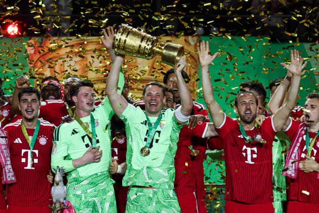 DFB Cup Final FC Bayern Munich VfB Stuttgart on 23 05 2026 at the Olympic Stadium in Berlin Goalkeeper Manuel Neuer Muenchen 1 lifts the trophy and cheers with his team about winning the DFB Cup MH