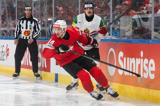 ZURICH, ZURICH - MAY 23: Dean Kukan of Switzerland battles with Bence Horvath of Hungary during the 2026 IIHF World Championship, WM, Weltmeisterschaft Preliminary Round Group A match between Switzerland and Hungary at Swiss Life Arena on May 23, 2026 in Zurich, Zurich, Switzerland.  Copyright: xLivioxBaeriswylx xSPPx Sportspressphoto_152912