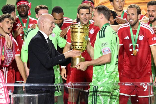 23 05 2026, xsltx, Football DFB Cup Final, FC Bayern Munich VfB Stuttgart v l jubilation, joy about the cup victory award ceremony Manuel Neuer FC Bayern Muenchen DFB President Bernd Neuendorf Deutscher Fussball Bund DFL DFB REGULATIONS PROHIBIT ANY USE OF PHOTOGRAPHS as IMAGE SEQUENCES and or QUASI VIDEO Berlin