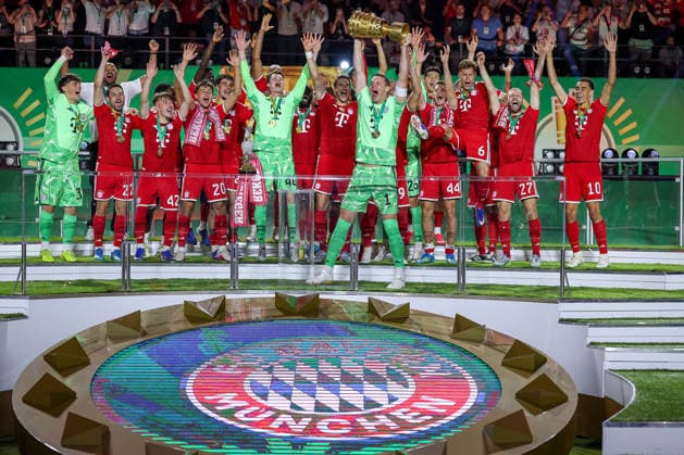 23 05 2026, Football, 83 DFB Pokal Final,, FC Bayern München VfB Stuttgart, Olympioastadion Berlin, Season 2025 2026 FC Bayern München is cup winner after the 3 0 victory Cup presentation ceremony Goalkeeper Manuel Neuer FC Bayern Muenchen 01 with the cup in his hand DFB regulations prohibit any use of photographs as image sequences and or quasi video Berlin Germany