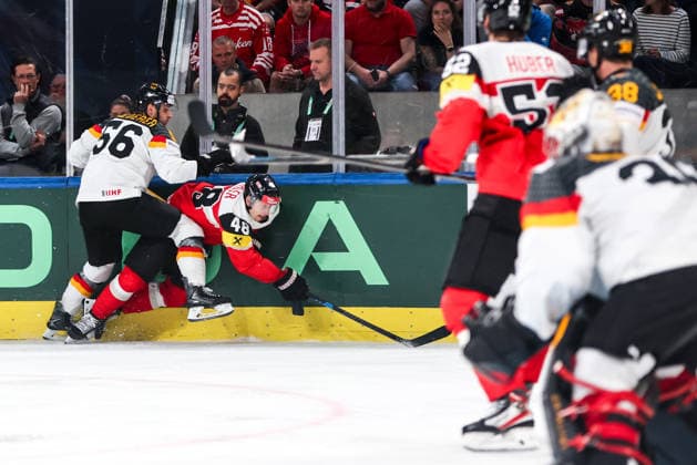Ice hockey, Eishockey - IIHF WC 2026 ZURICH,SWITZERLAND,23.MAY.26 - ICE HOCKEY - IIHF Ice Hockey World Championship, WM, Weltmeisterschaft 2026, group stage, Austria vs Germany. Image shows Manuel Wiederer (GER) and Lucas Thaler (AUT).  GEPAxpictures xMaticxKlansek