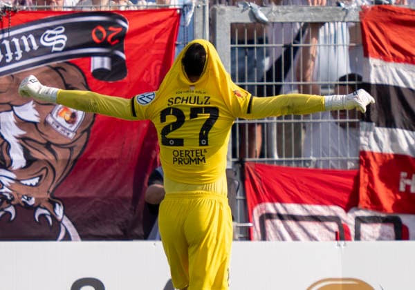 Arne Schulz Viktoria Koeln, 27 saves the decisive penalty kick from Dejan Galjen Fortuna Koeln, 24 and thus secures the cup victory Here he is celebrated by the fans in front of the fan curve SC Fortuna Köln vs Viktoria Köln 23 05 2026 Football, Bitburger Pokalfinale 2026, GER, Sportpark Höhenberg, Cologne Copyright: HMBxMedia xMarcoxBader