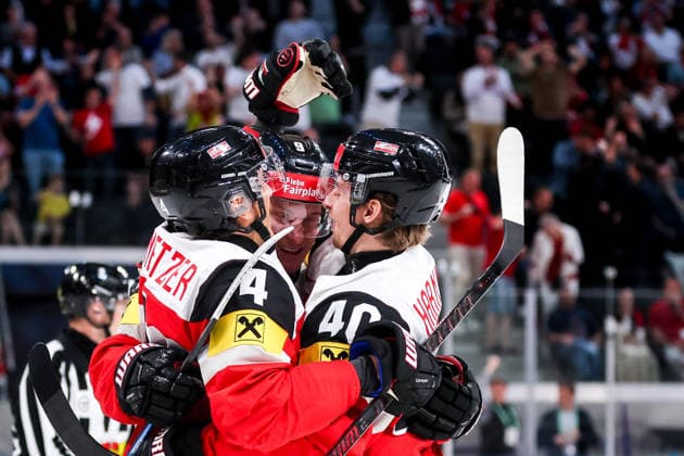 Ice hockey, Eishockey - IIHF WC 2026 ZURICH,SWITZERLAND,23.MAY.26 - ICE HOCKEY - IIHF Ice Hockey World Championship, WM, Weltmeisterschaft 2026, group stage, Austria vs Germany. Image shows the rejoicing of Ramon Schnetzer, Leon Wallner and Tim Harnisch (AUT).  GEPAxpictures xMaticxKlansek