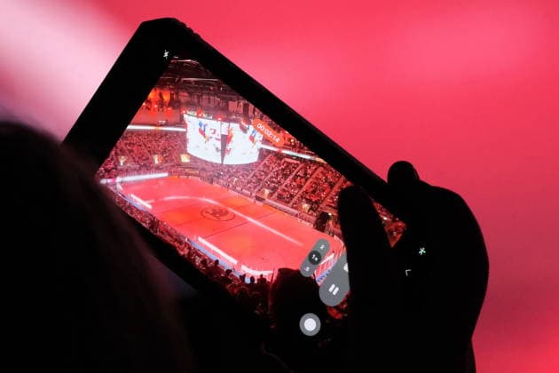 IIHF - World Championship, WM, Weltmeisterschaft - Austria vs Germany - fans with smartphone Zurich Swiss Life Arena Zürich Schweiz Copyright: xSergioxBrunettix
