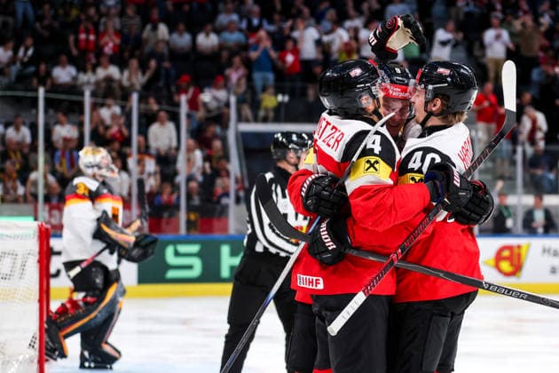 Ice hockey, Eishockey - IIHF WC 2026 ZURICH,SWITZERLAND,23.MAY.26 - ICE HOCKEY - IIHF Ice Hockey World Championship, WM, Weltmeisterschaft 2026, group stage, Austria vs Germany. Image shows the rejoicing of Ramon Schnetzer, Leon Wallner and Tim Harnisch (AUT).  GEPAxpictures xMaticxKlansek