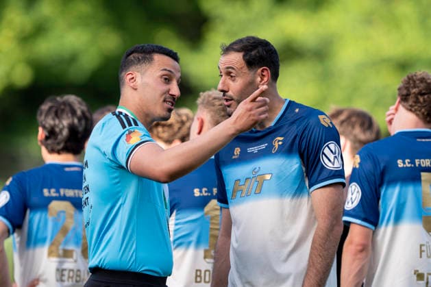 Tarik Damar DFB referee in conversation with Hamadi Al Ghaddioui Fortuna Koeln, 18 SC Fortuna Köln vs Viktoria Köln 23 05 2026 Football, Bitburger Pokalfinale 2026, GER, Sportpark Höhenberg, Cologne Copyright: HMBxMedia xMarcoxBader