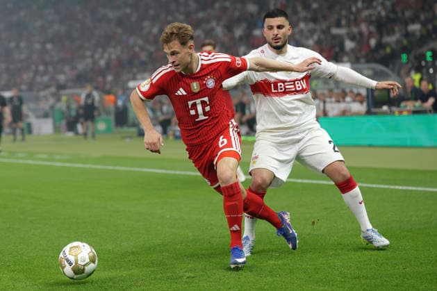 Joshua Kimmich FC Bayern München and Deniz Undav VfB Stuttgart battle for the ball during the DFB Cup Final 2026 match between FC Bayern München and VfB Stuttgart at Olympiastadion on May 23, 2026 in Berlin, Germany Photo by Oliver Kaelke DeFodi Images