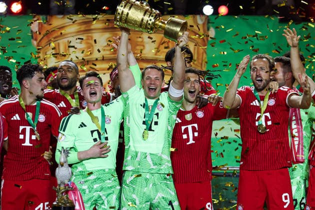 DFB Cup Final FC Bayern Munich VfB Stuttgart on 23 05 2026 at the Olympiastadion in Berlin Goalkeeper Manuel Neuer Muenchen 1 and goalkeeper Jonas Urbig Muenchen 40 lift the trophy and cheer with their team about winning the DFB Cup MH