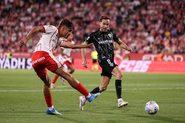 May 23, 2026, Girona, Girona, SPAIN: Hugo Rincon of Girona FC and Marc Aguado of Elche CF in action during the Spanish league, LaLiga EA Sports, football match played between Girona FC and Elche CF at Montilivi stadium on May 23, 2026 in Girona, Spain. Girona FC V Elche CF - LaLiga EA Sports  - ZUMAa181 20260523_zaa_a181_329 Copyright: xJavierxBorregox