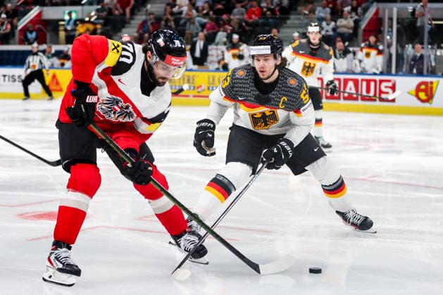 Ice hockey, Eishockey - IIHF WC 2026 ZURICH,SWITZERLAND,23.MAY.26 - ICE HOCKEY - IIHF Ice Hockey World Championship, WM, Weltmeisterschaft 2026, group stage, Austria vs Germany. Image shows Benjamin Nissner (AUT) and Moritz Seider (GER).  GEPAxpictures xMaticxKlansek