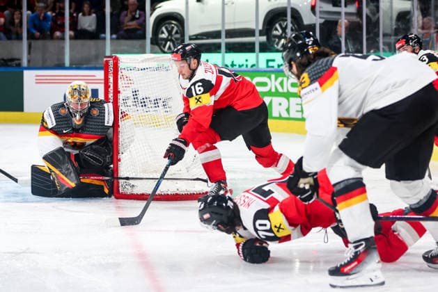 Ice hockey, Eishockey - IIHF WC 2026 ZURICH,SWITZERLAND,23.MAY.26 - ICE HOCKEY - IIHF Ice Hockey World Championship, WM, Weltmeisterschaft 2026, group stage, Austria vs Germany. Image shows Philipp Grubauer (GER) and Dominic Zwerger (AUT).  GEPAxpictures xMaticxKlansek