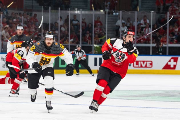 ZURICH, ZURICH - MAY 23: Eric Mik of Germany battles with Leon Kolarik of Austria during the 2026 IIHF World Championship, WM, Weltmeisterschaft match between Austria and Germany at Swiss Life Arena on May 23, 2026 in Zurich, Zurich, Switzerland.  Copyright: xLivioxBaeriswylx xSPPx Sportspressphoto_153009