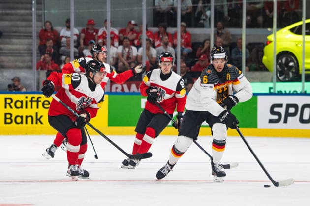 ZURICH, ZURICH - MAY 23: Tim Harnisch of Austria chases Kai Wissmann of Germany during the 2026 IIHF World Championship, WM, Weltmeisterschaft match between Austria and Germany at Swiss Life Arena on May 23, 2026 in Zurich, Zurich, Switzerland.  Copyright: xLivioxBaeriswylx xSPPx Sportspressphoto_153025