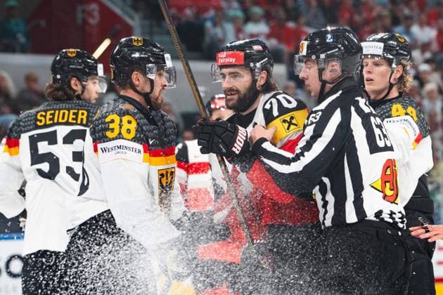 ZURICH, ZURICH - MAY 23: Fabio Wagner of Germany and Benjamin Nissner of Austria get tangled up during the 2026 IIHF World Championship, WM, Weltmeisterschaft match between Austria and Germany at Swiss Life Arena on May 23, 2026 in Zurich, Zurich, Switzerland.  Copyright: xLivioxBaeriswylx xSPPx Sportspressphoto_153026