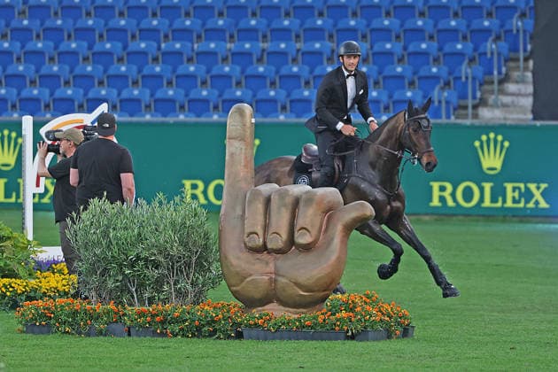 Richard Vogel in a tuxedo through the Aachen Soers and past the Öcher Klenkes obstacle and finger pointing, greeting from the people of Aachen, Horse Symphony concert, supporting program, motto of the evening James Bond, World Equestrian Festival, World Equestrian Festival, TSCHIO Aachen 2026, TSCHIO instead of CHIO 2026, Aachener Soers, May 22nd to 24th 2026, equestrian sport, May 23rd 2026, Aachener Soers Germany