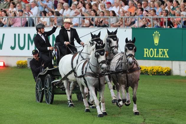 Richard Vogel on a carriage in a tuxedo as the James Bond of equestrian sport, concert horse symphony, supporting program, motto of the evening James Bond, World Equestrian Festival, TSCHIO Aachen 2026, TSCHIO instead of CHIO 2026, Aachener Soers, 22 to 24 May 2026, equestrian sport, 23 05 2026, Aachen Aachener Soers Germany