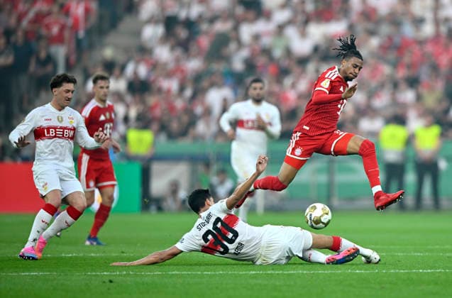 Michael Olise FC Bayern Muenchen FCB 17 Action on the ball against Jose Maria Chema Andres Baixauli VfB Stuttgart 30 83 DFB Pokalfinale FC Bayern Muenchen FCB vs VFB Stuttgart Olympiastadion Berlin 23 05 2026 DFL REGULATIONS PROHIBIT ANY USE OF PHOTOGRAPHS AS IMAGE SEQUENCES AND OR QUASI VIDEO 83 DFB Pokalfinale FC Bayern Muenchen FCB vs VFB Stuttgart