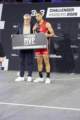 Worthy de Jong of Amsterdam RABOBANK NED is honored with the MVP award at the FIBA 3x3 Hamburg Challenger 2026 in the Active City Arena Hamburg The Dutch player accepts the trophy and is honored for his outstanding performance at the international 3x3 basketball tournament Worthy de Jong Amsterdam RABOBANK receives MVP award at FIBA 3x3 Hamburg Challenger Copyright: xspeedshotx