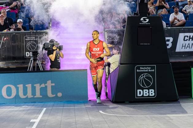 Worthy de Jong of Amsterdam RABOBANK NED runs in at the FIBA 3x3 Hamburg Challenger on May 23, 2026 at the Active City Arena in Hamburg The player enters the court with a dramatic smoke atmosphere and purple lighting at the start of the game Worthy de Jong Amsterdam RABOBANK enters Active City Arena Copyright: xspeedshotx