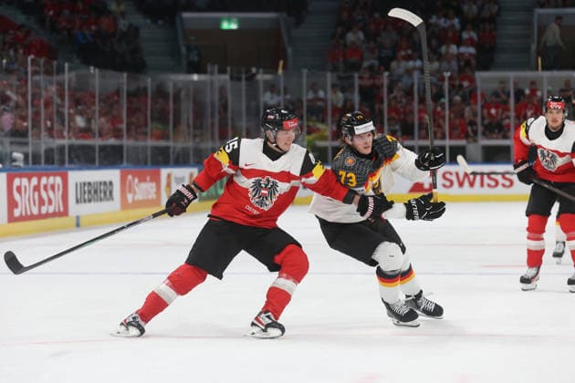 23 05 2026 Swiss Life Arena Zuerich , SWITZERLAND, Men Ice Hockey IIHF World Championship Zurich 2026 Group A AUT GER Gregor Biber li,AUT against Lukas Reichel GER
