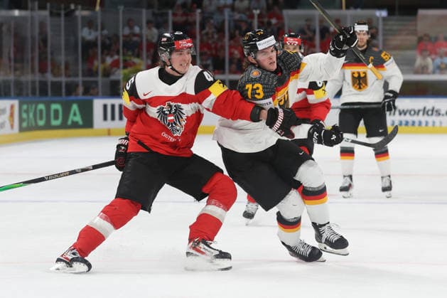 23 05 2026 Swiss Life Arena Zuerich , SWITZERLAND, Men Ice Hockey IIHF World Championship Zurich 2026 Group A AUT GER Gregor Biber li,AUT against Lukas Reichel GER
