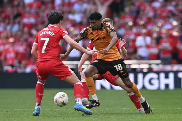 Hull City v Middlesbrough, EFL Sky Bet Championship, Play Off Final Cody Drameh (18) of Hull City on the attack battles for possession with Hayden Hackney (7) of Middlesbrough during the EFL Sky Bet Championship match between Hull City and Middlesbrough at Wembley Stadium, London, UK on 23 May 2026. London Wembley Stadium Greater London UK Editorial use only DataCo restrictions apply See www.football-dataco.com , Copyright: xGrahamxHuntx PSI-24303-0295