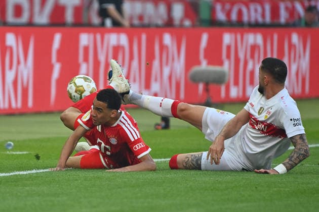Jeff CHABOT VFB Stuttgart , action,duel against Jamal MUSIALA Bayern Muenchen Fussball 83 DFB Pokal Final 2026 FC Bayern Muenchen VfB Stuttgart 3 0 am 23 05 2026, Olympiastadion in Berlin DFL DFB regulations prohibit any use of photographs as image sequences and or quasi video