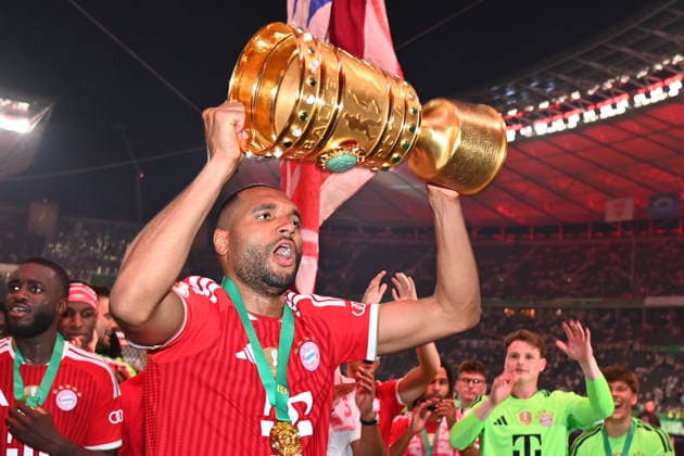 Jonathan TAH Bayern Muenchen with trophy,cup,trophaee, jubilation,joy,enthusiasm, award ceremony Football 83 DFB Pokal Final 2026 FC Bayern Muenchen VfB Stuttgart 3 0 am 23 05 2026, Olympiastadion in Berlin DFL DFB regulations prohibit any use of photographs as image sequences and or quasi video