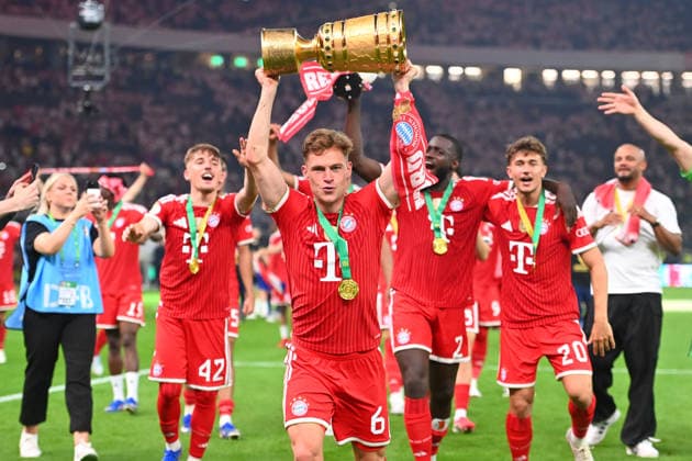 Joshua KIMMICH Bayern Muenchen with Cup,Cup,Trophy,Cheering,Joy,Enthusiasm,Award Ceremony Football 83 DFB Pokal Final 2026 FC Bayern Muenchen VfB Stuttgart 3 0 am 23 05 2026, Olympiastadion in Berlin DFL DFB regulations prohibit any use of photographs as image sequences and or quasi video
