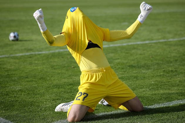 23 05 2026, xsefx, Football, Final Bitburger Pokal, FC Viktoria Köln S C Fortuna Koeln, Sportpark Höhenberg, Saison 2025 2026 Goalkeeper Arne Schulz Viktoria Koeln, 27 cheers with his face hidden in his jersey after holding a penalty kick and winning the cup DFB regulations prohibit any use of photographs as image sequences and or quasi video Photo xSabinexEffgenxPressefotoKochx Nordrhein Westfalen Germany