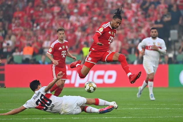 Chema ANDRES VFB Stuttgart , action,duel against Michael OLISE Bayern Muenchen Fussball 83 DFB Pokal Final 2026 FC Bayern Muenchen VfB Stuttgart 3 0 am 23 05 2026, Olympiastadion in Berlin DFL DFB regulations prohibit any use of photographs as image sequences and or quasi video