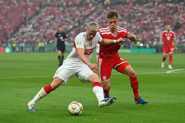Ermedin DEMIROVIC VFB Stuttgart , Joshua KIMMICH Bayern Muenchen , action,duel football 83 DFB Pokal Final 2026 FC Bayern Muenchen VfB Stuttgart 3 0 am 23 05 2026, Olympiastadion in Berlin DFL DFB regulations prohibit any use of photographs as image sequences and or quasi video