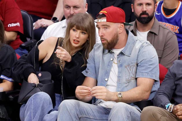 Taylor Swift (L) and Travis Kelce attend he Cleveland Cavaliers Eastern Conference Final game against the New York Knicks in Cleveland, Ohio Saturday May 23, 2026.  CLE20260523103 AARONxJOSEFCZYK